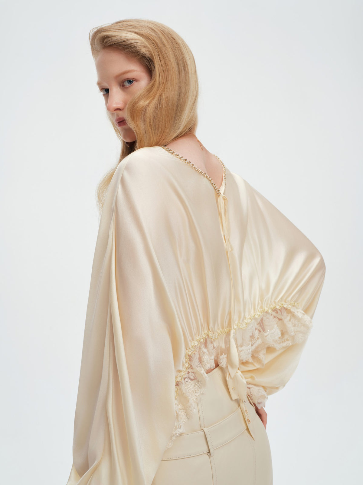 Pearl Wonderland Lace-Spliced Tie Batwing Knit Top lookbook