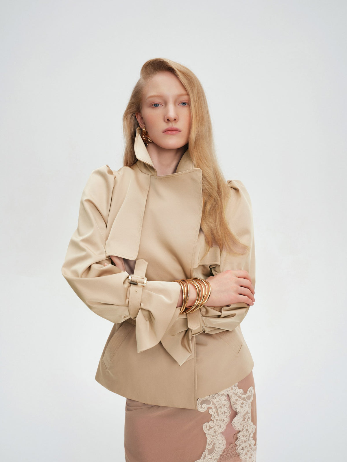 Trench coat sleeve and amber jade button detail