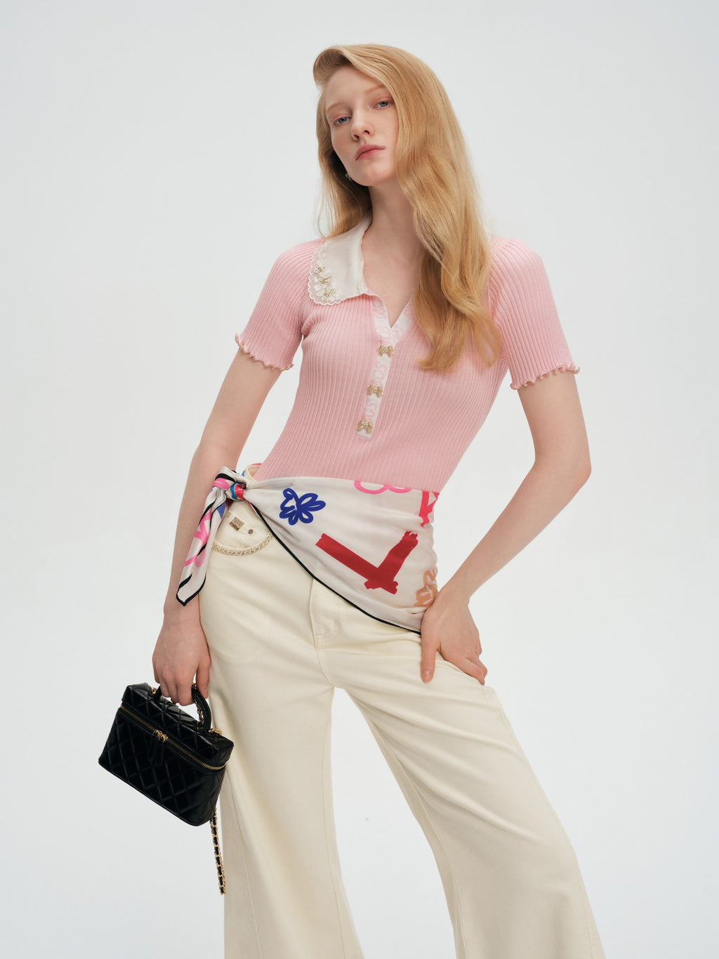 Pearl Wonderland Spliced Lace-Collar Knit Polo Top fabric close-up