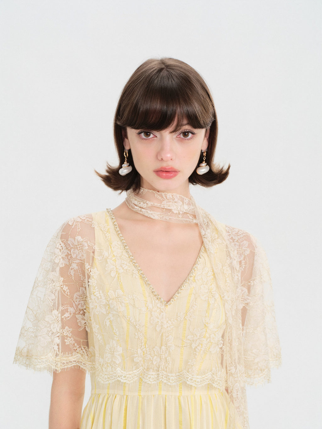Riviera Lace Cape Illusion Maxi Dress movement