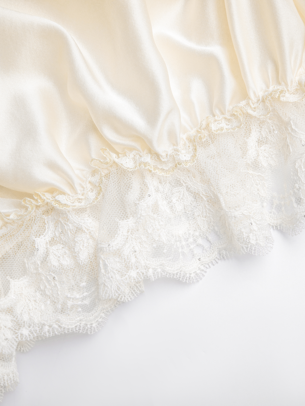 Pearl Wonderland Lace-Spliced Tie Batwing Knit Top white background