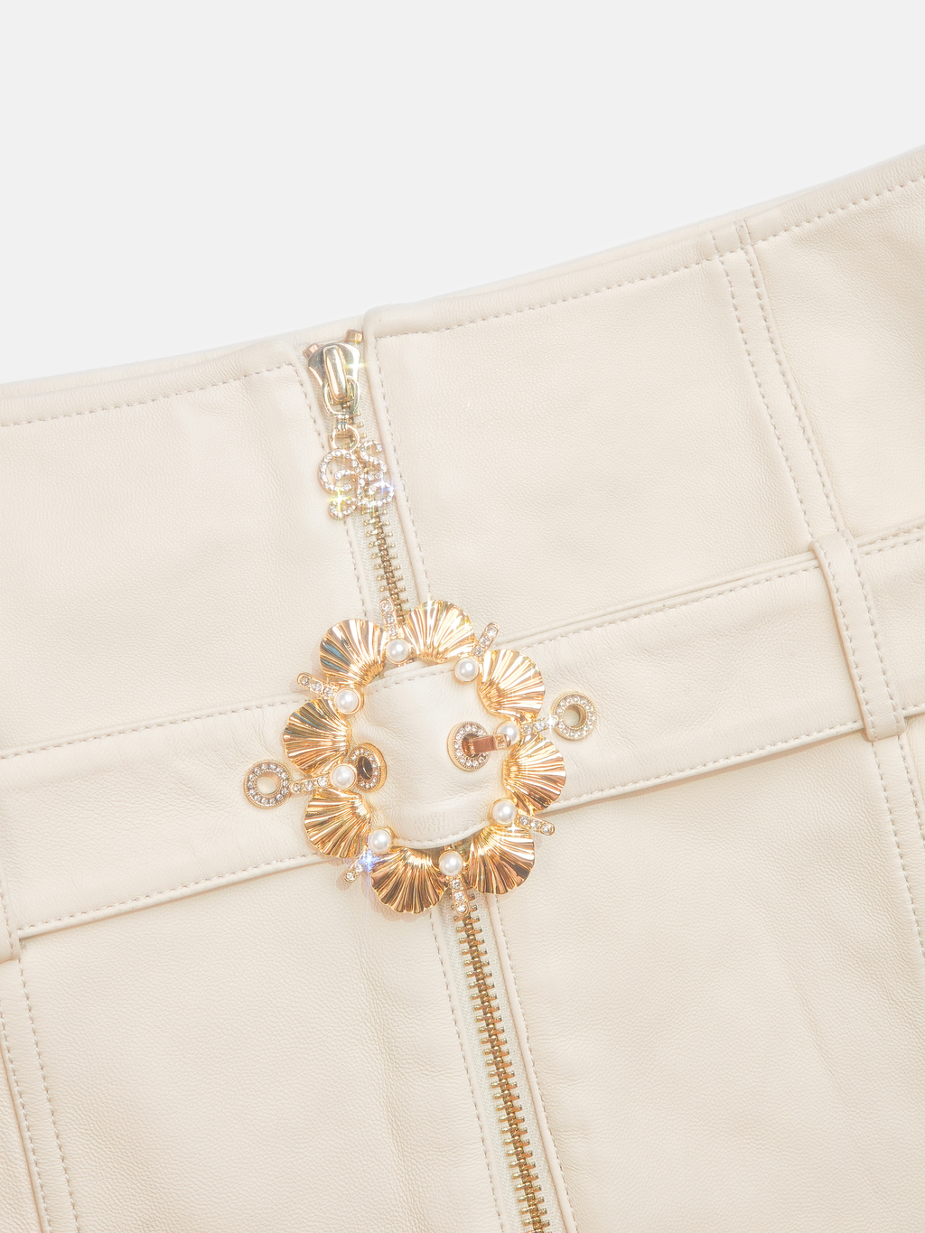 Pearl Wonderland Buckle Leather Mini Skirt white background